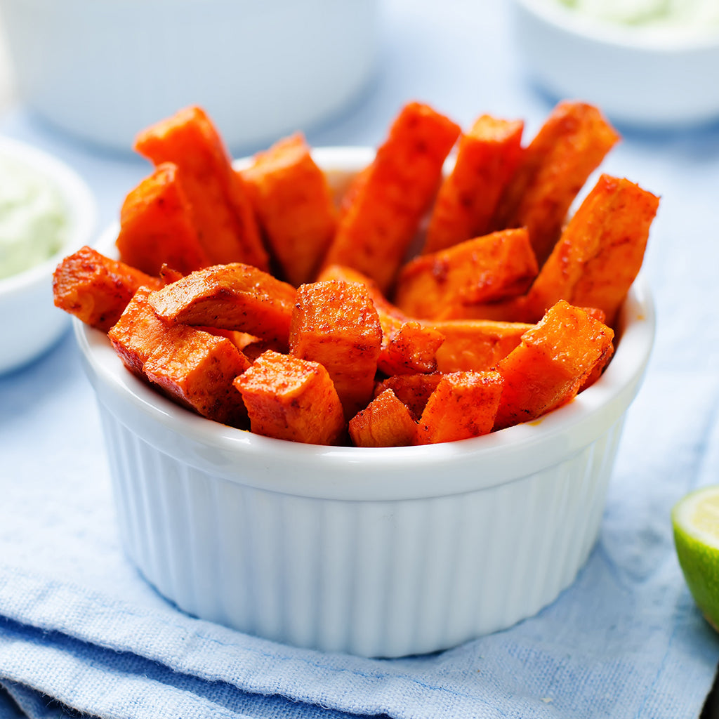 Chipotle Lime Roasted Sweet Potato Wedges with Avocado Dip