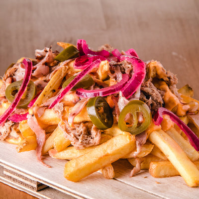 Ultimate Loaded Cheesy Fries with Pulled Pork, Jalapeños, and All the Fixings