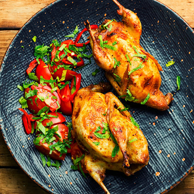 Quail with Charred Lemon and Herb Salad